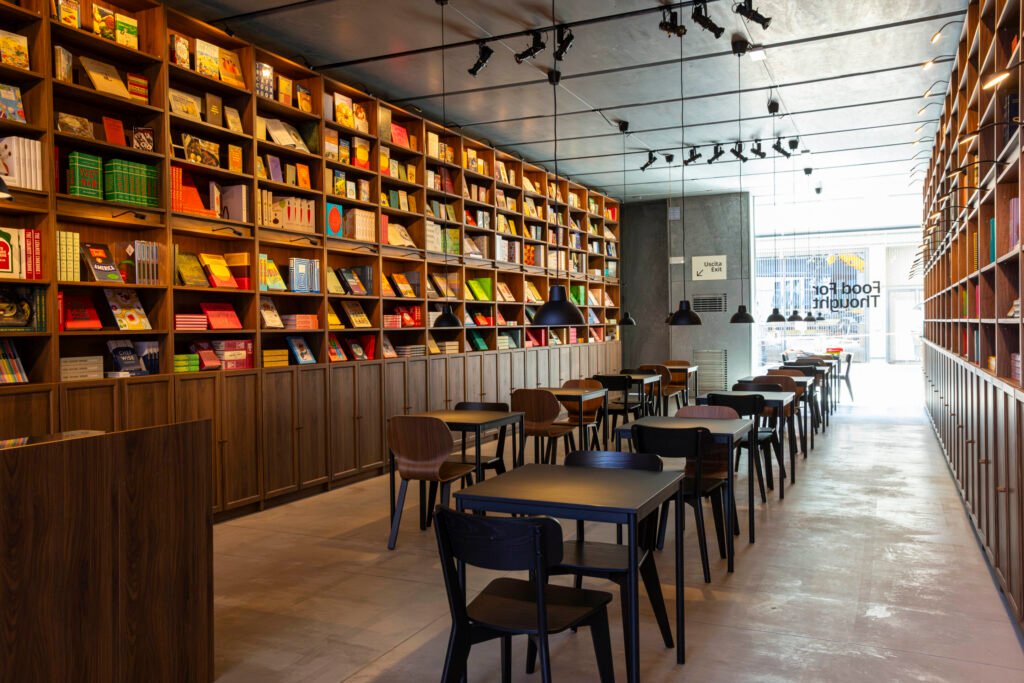 The visit concludes at the BILLY café, a reflective, library-inspired space framed by the iconic BILLY bookcase. The setting invites visitors to slow down and reflect through a curated selection of 1,000 cookbooks by Phaidon, offering a pause within the intensity of Design Week.

